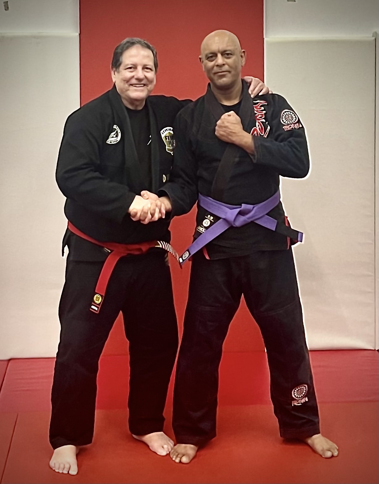 Satyen Raja receiving Purple Belt with Marcus Soares